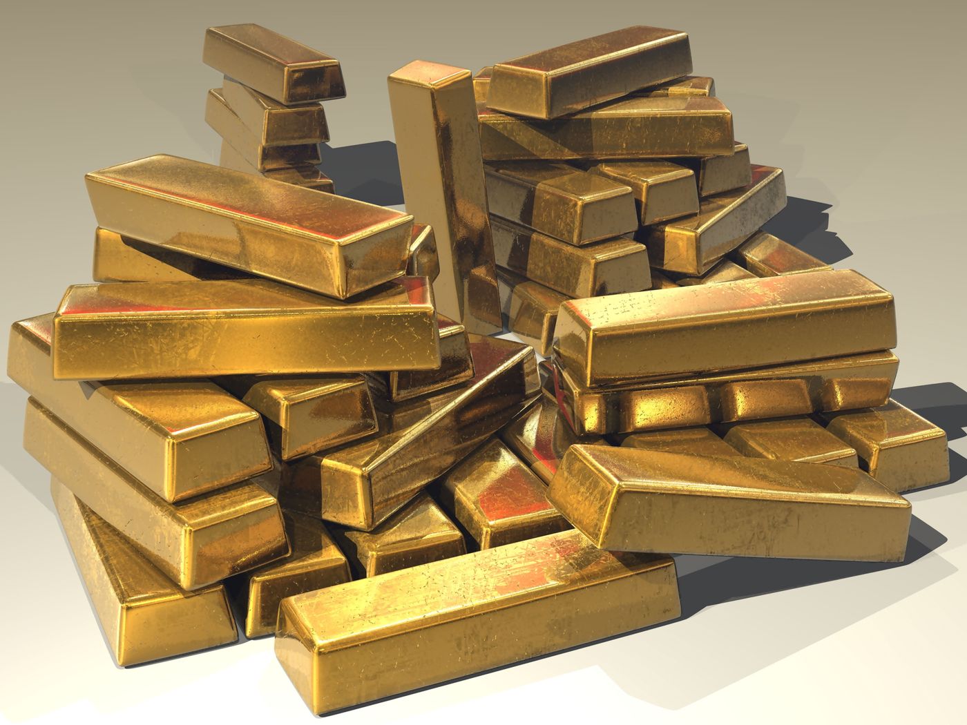 Pile of gold bars in secure storage